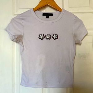 Wire shirt with flowers size large has some stains in the front